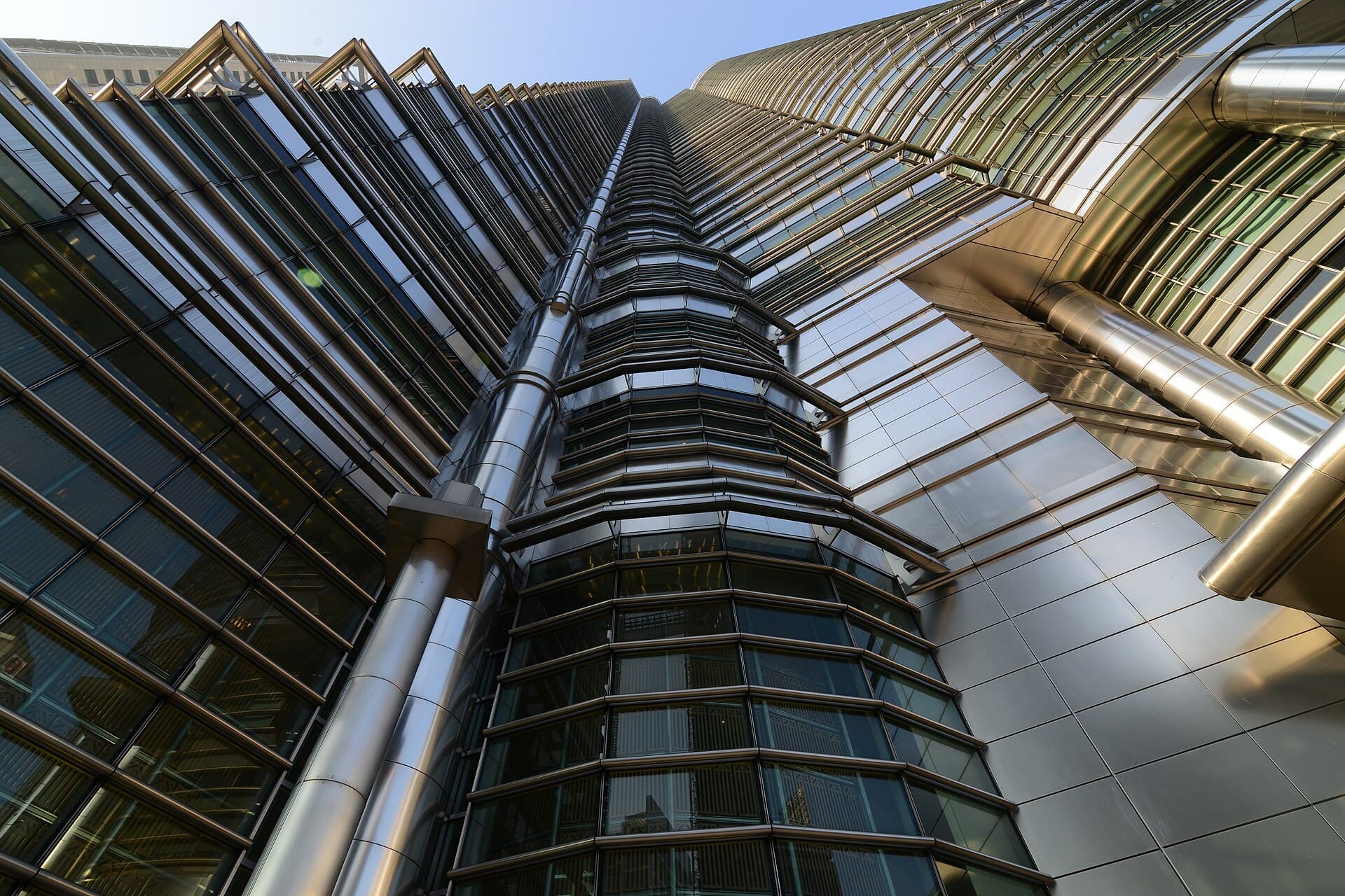 Steel and glass tower façade photographed from below